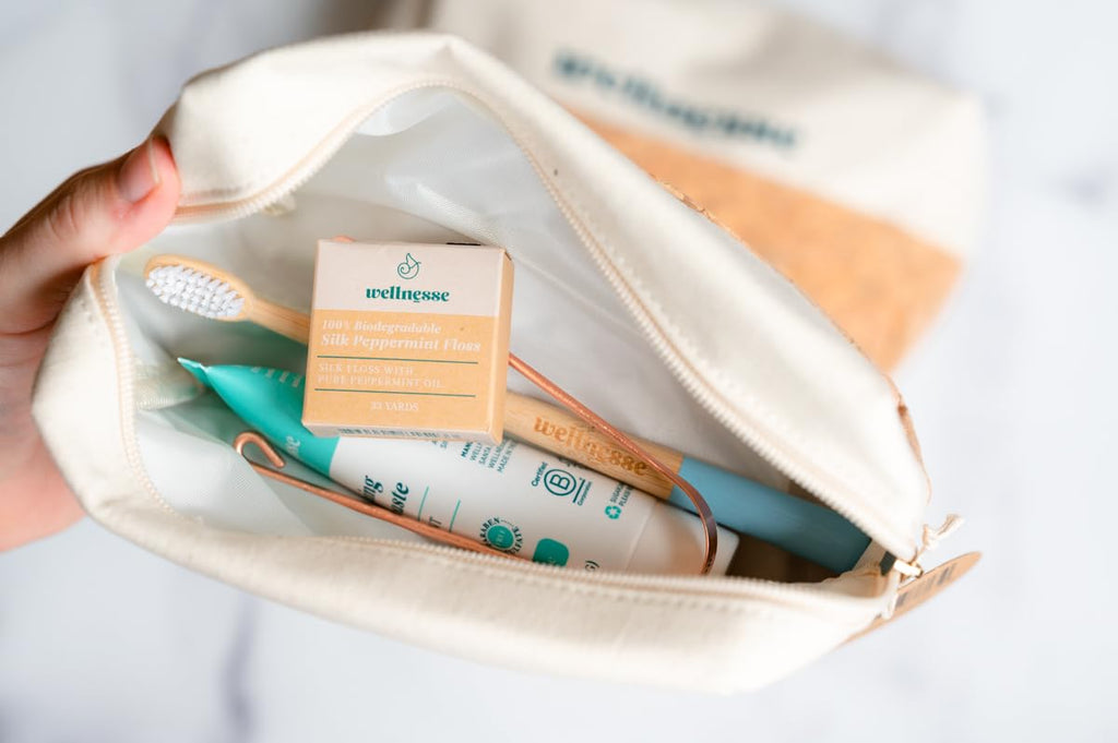 Wellnesse Essential Travel Oral Care Set - Compact Travel Dental Kit w/ 4 oz Whitening Hydroxyapatite Toothpaste, Adult Toothbrush, Copper Tongue Scraper, Silk Floss & Eco-Friendly Pouch, Mint Flavor