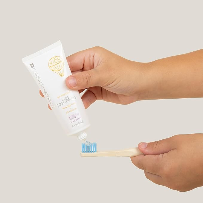 CariFree Naturals Kids Toothpaste | Fluoride-Free, 40% Xylitol, Organic Wild Berry Flavor, pH Elevated, Safe if Swallowed, Sugar-Free, 2.4 oz, Dentist Developed (Pack of 2)