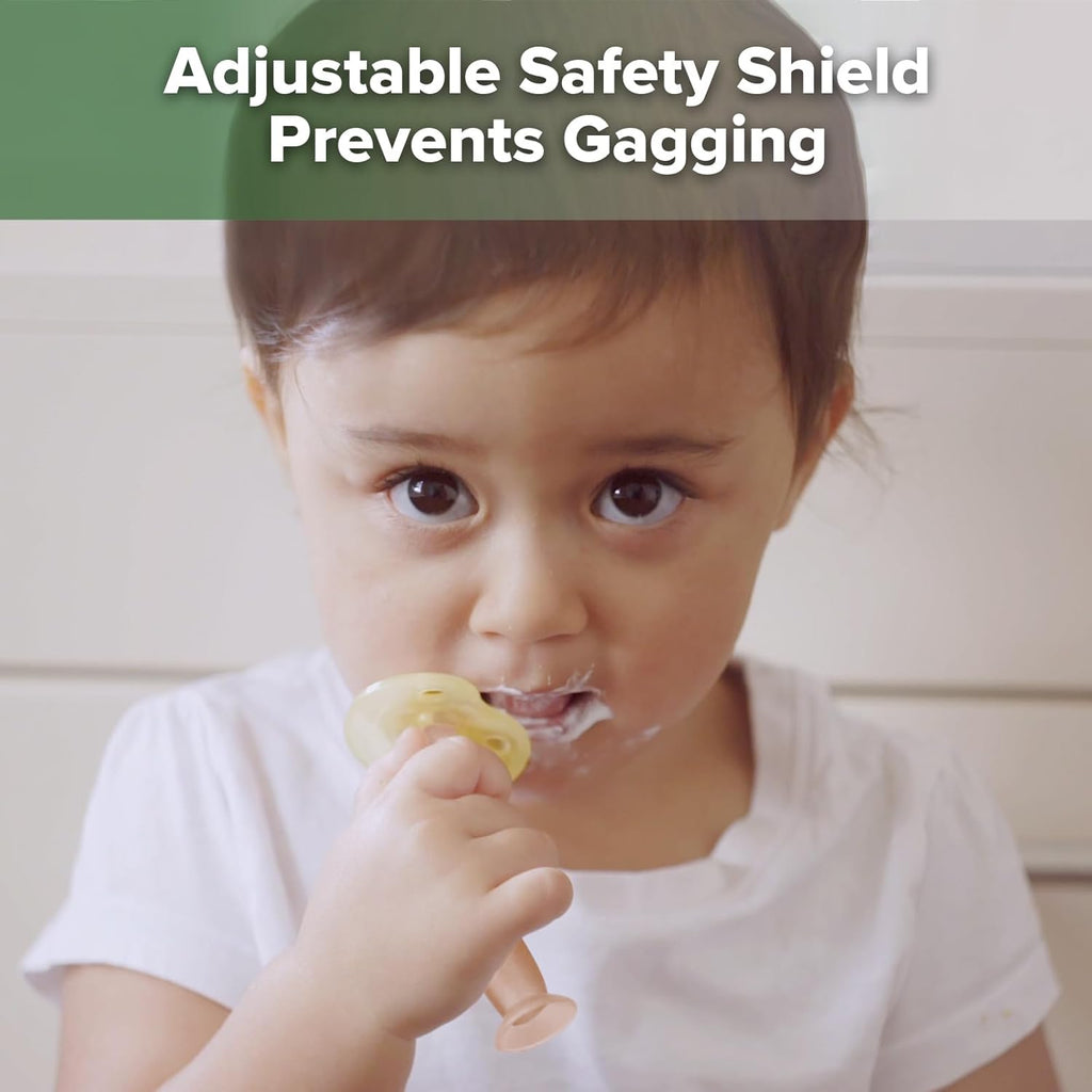 haakaa 360° Baby Toothbrush with Suction Base - Gentle Cleaning for Toddler's Self-Brushing Training, Food-Grade Silicone, Adjustable Safety Shield - Pink (1 Piece)