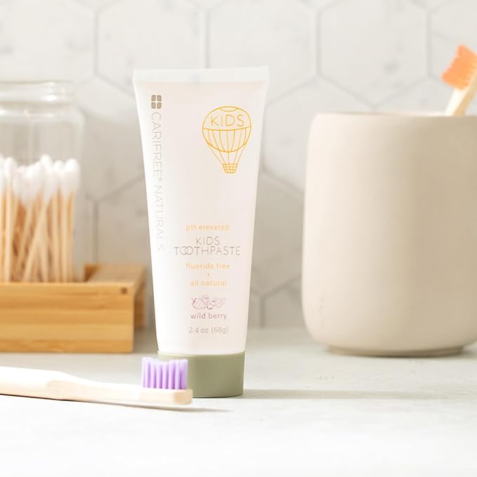 CariFree Naturals Kids Toothpaste | Fluoride-Free, 40% Xylitol, Organic Wild Berry Flavor, pH Elevated, Safe if Swallowed, Sugar-Free, 2.4 oz, Dentist Developed (Pack of 2)