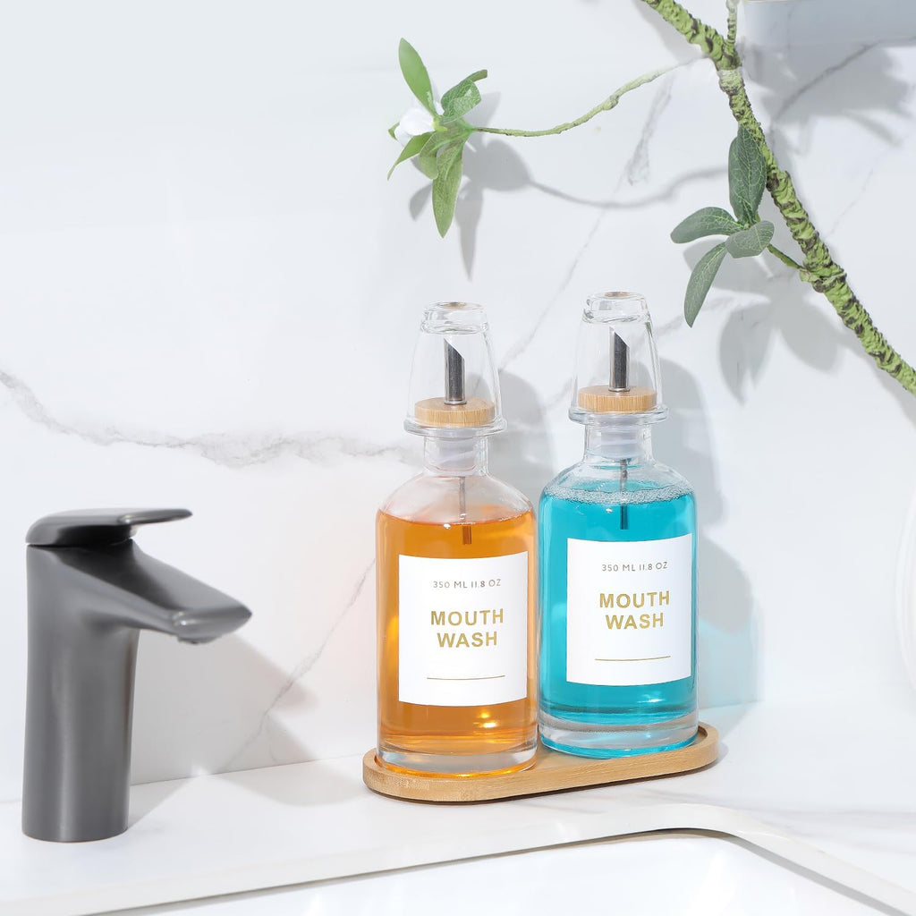 11.8OZ Glass Mouthwash Dispenser for Bathroom with Stainless Steel & Bamboo Nozzle, Mouthwash Cup Reusable, Bamboo Tray, and Elegant Gold Sticker.Set of 2（Clear