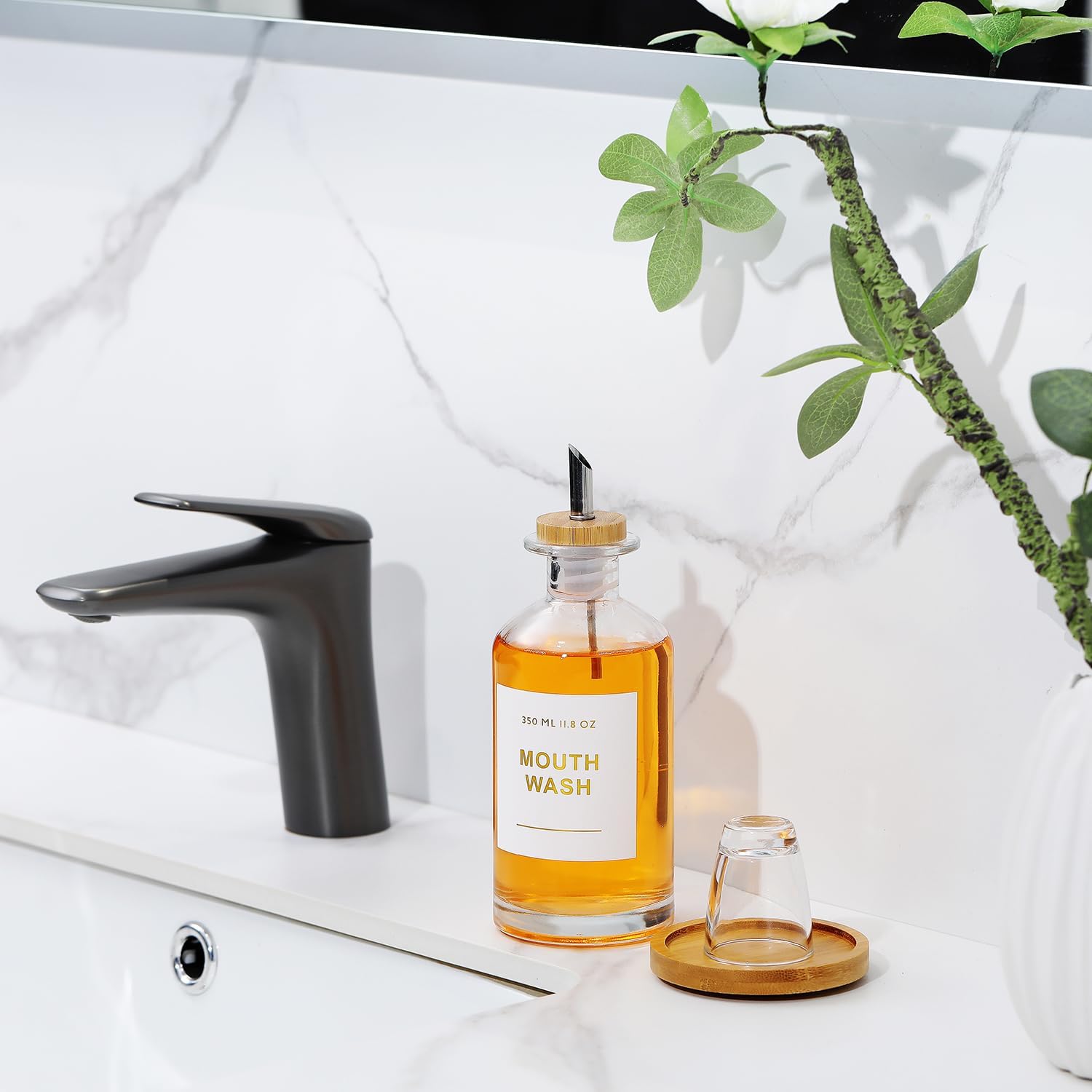 11.8OZ Glass Mouthwash Dispenser for Bathroom with Stainless Steel & Bamboo Nozzle, Mouthwash Cup Reusable, Bamboo Tray, and Elegant Gold Sticker.（Clear