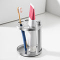 Stainless Toothbrush Holder Stand for Bathroom: Stainless Steel Ventilated Organizer with Slots for Electric Toothbrushes, Toothpaste, Razors & Small Comb, Unique Footprint Base Design, Brushed Silver