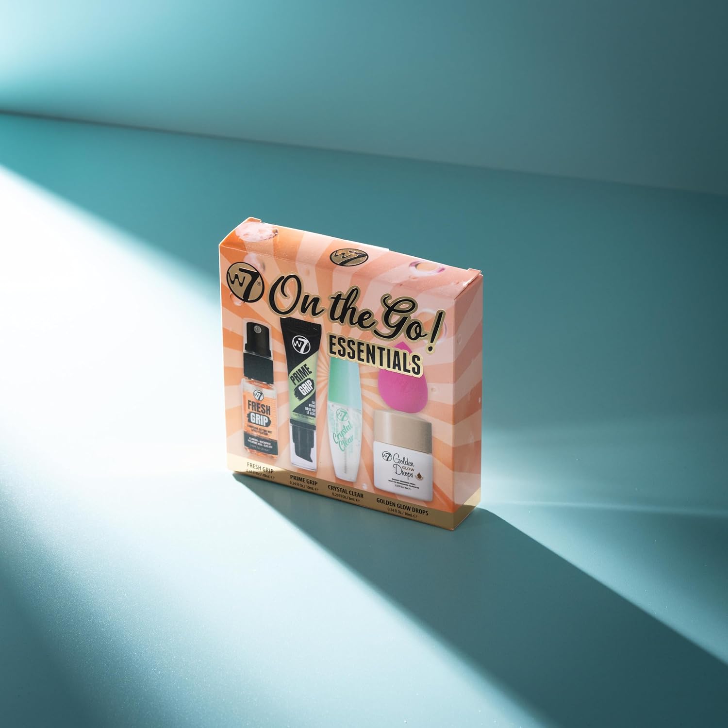 W7 On the Go Essentials Gift Set - Mini Makeup Must-Haves with Primer, Setting Spray, Mascara, Golden Glow Bronzing Drops & Beauty Sponge - Travel or Handbag Size Essentials