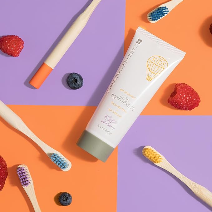 CariFree Naturals Kids Toothpaste | Fluoride-Free, 40% Xylitol, Organic Wild Berry Flavor, pH Elevated, Safe if Swallowed, Sugar-Free, 2.4 oz, Dentist Developed (Pack of 2)