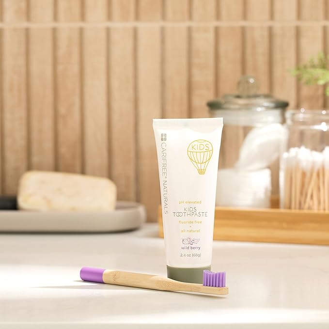 CariFree Naturals Kids Toothpaste | Fluoride-Free, 40% Xylitol, Organic Wild Berry Flavor, pH Elevated, Safe if Swallowed, Sugar-Free, 2.4 oz, Dentist Developed (Pack of 4)