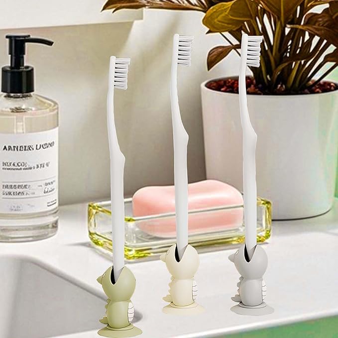 Mini Dinosaur Toothbrush Holder Stand with Suction Cup, Silicone Toothbrush Head Cover, Travel Protector, Bathroom Vanity Organizer for Adults Kids